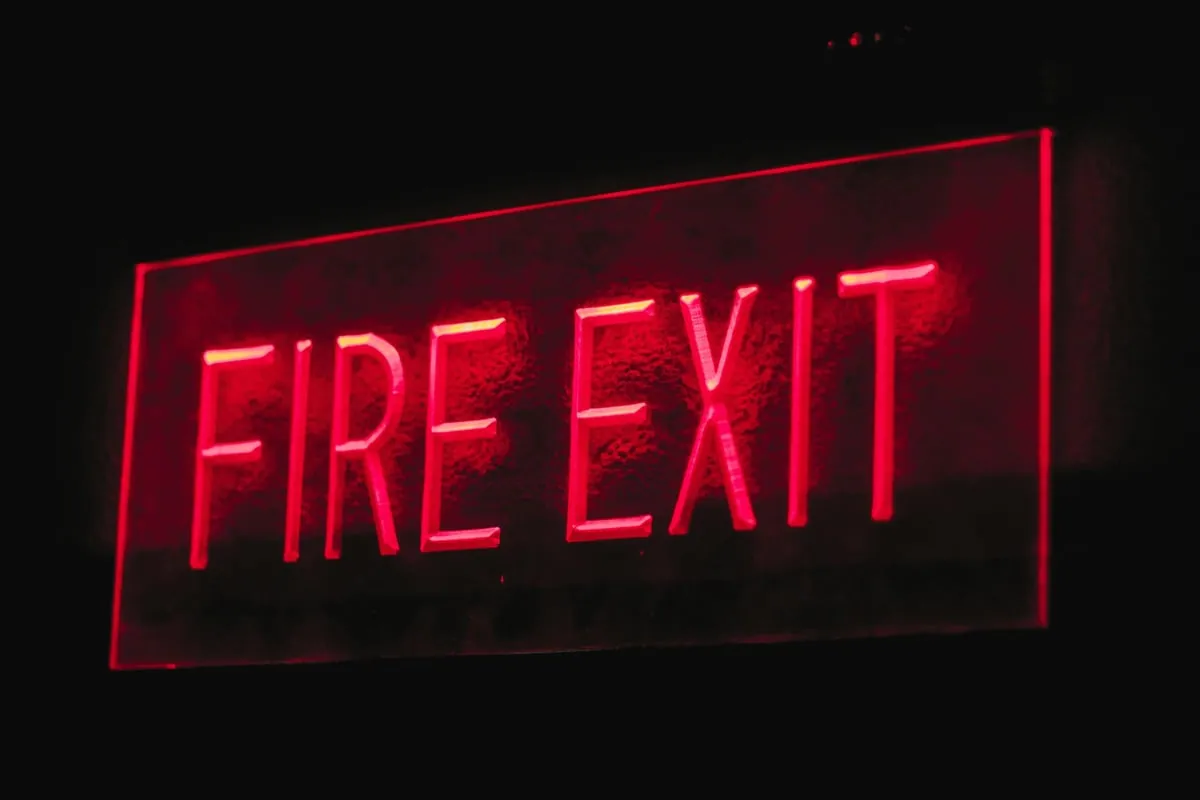 Illuminated fire exit sign